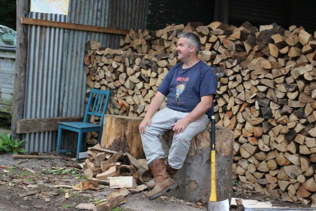 Graham taking a break from splitting logs